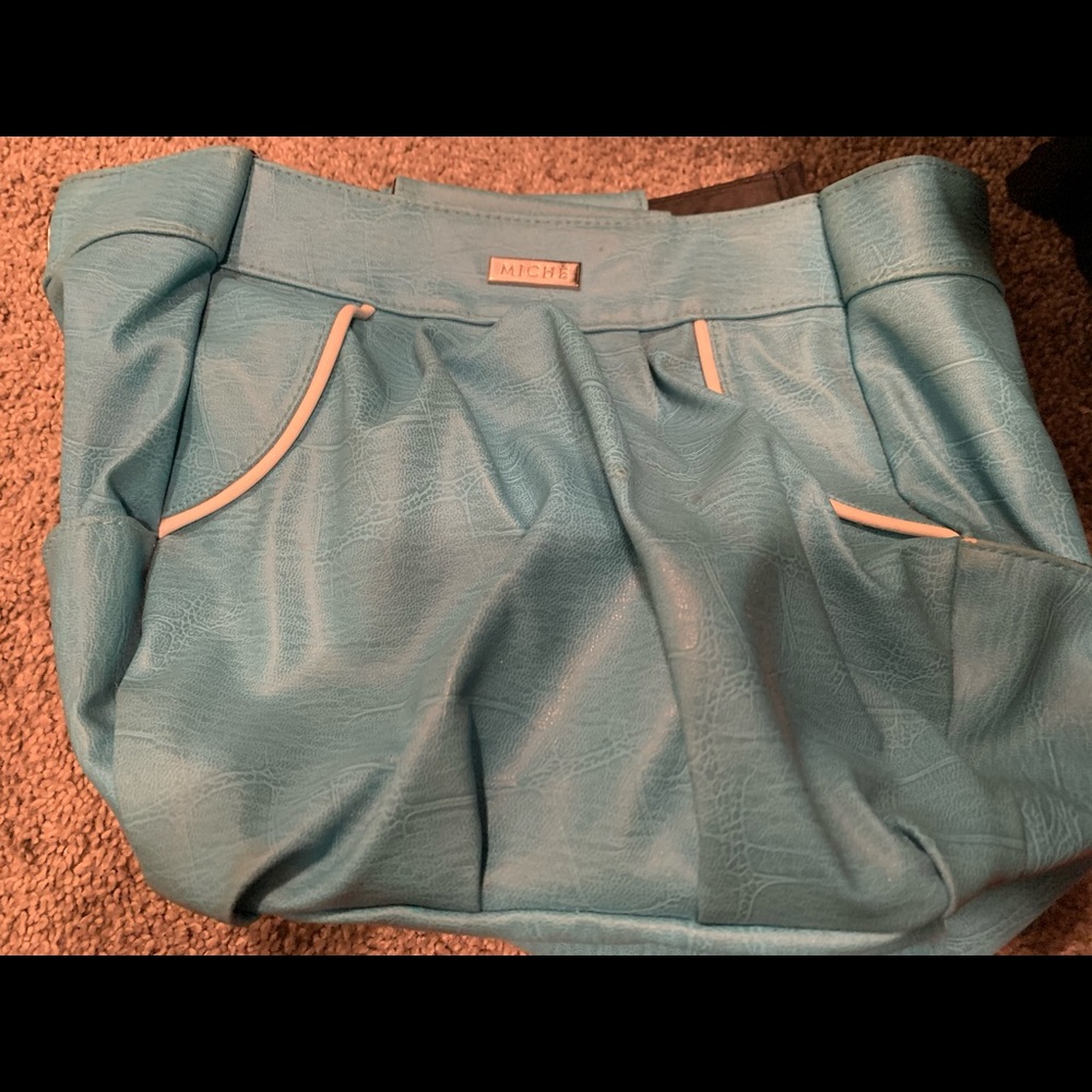 Gently used Miche turquoise shell